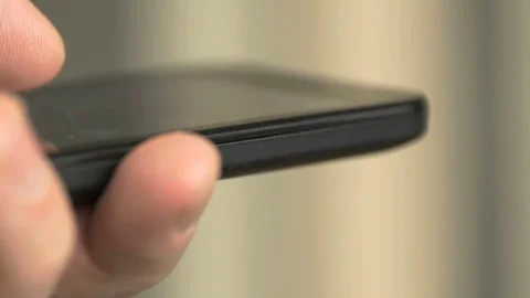 Businessman using a a mobile phone for working Stockbeeldmateriaal 71777122
