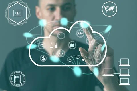 Businessman using modern computer, pressing button on virtual screen. cloud Stock Photos