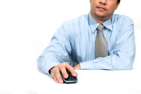 Businessman using a mouse Stock Photos