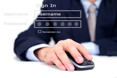 Businessman using a mouse Stock Photos