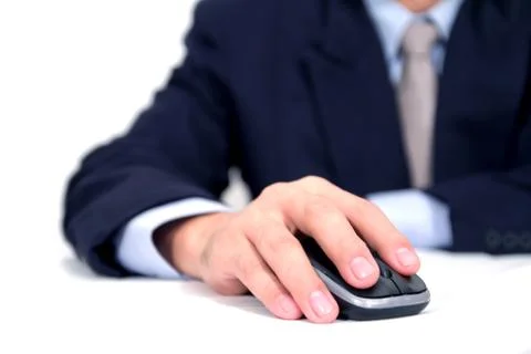 Businessman using a mouse Stock Photos