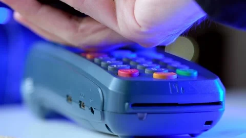 Businessman using NFC technology for paying in shop or cafe. Man phone payment. Stock Footage 148682339