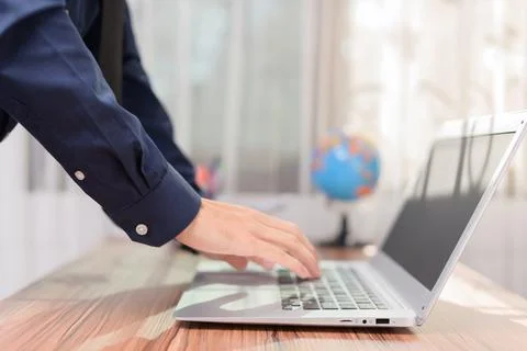Businessman using notebook computer in office Foto stock