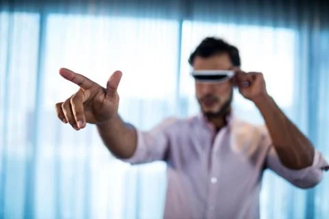 Businessman using an oculus Stock Photos