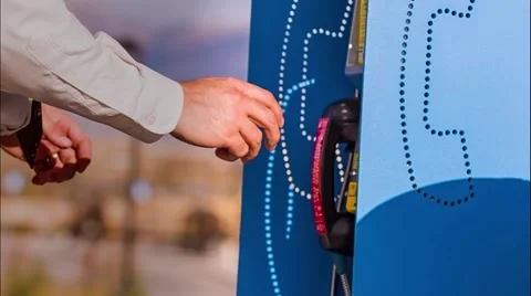 Businessman using a pay phone Stock Footage 41324235