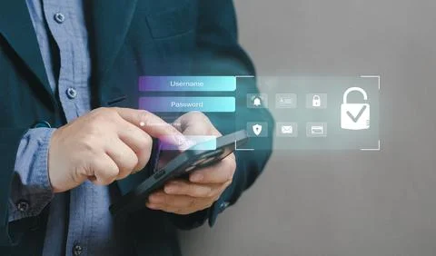 Businessman using pen on virtual screen with shield of security, online sec.. Stock Photos