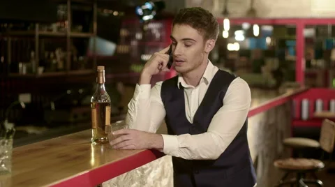 Businessman Using Phone at the Bar Stock-Footage 62898845