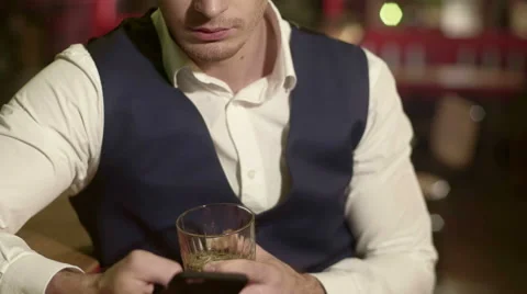 Businessman Using Phone at the Bar Video stock 62898867