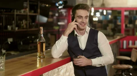 Businessman Using Phone at the Bar Stock Footage 62898896