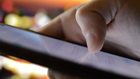 Businessman using phone for scrolling google e mail app on night city. 動画素材 223131771
