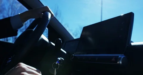 A businessman is using  self pilot on a futuristic screen with holograms. Video stock 115359228