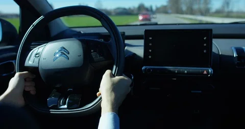 A businessman is using  self pilot on a futuristic screen with holograms. Video stock 115359346