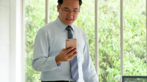 Businessman using smart digital tablet at office desk Stock Footage 288922637