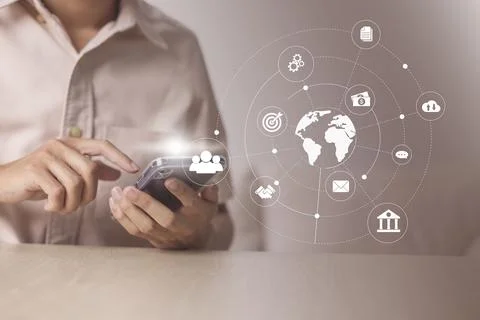 Businessman using smart phone to do online transactions with internet technol Stock Photos