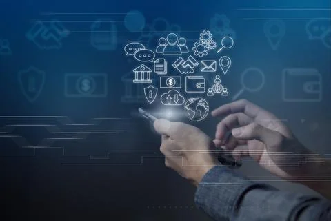Businessman using smart phone to do online transactions with internet technol Stock Photos