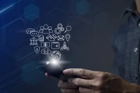 Businessman using smart phone to do online transactions with internet technol Stock Photos