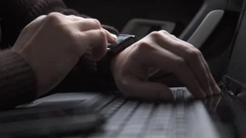 Businessman using smart watch while sitting in car Stock Footage 271049279