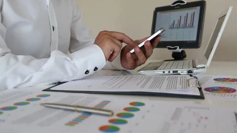 Businessman Using Smartphone Among Work Documents Stock Footage 346180520