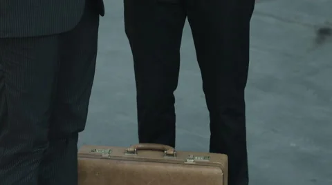 Businessman using smartphone and tablet computer with coworker: team work Stock Footage 42992275