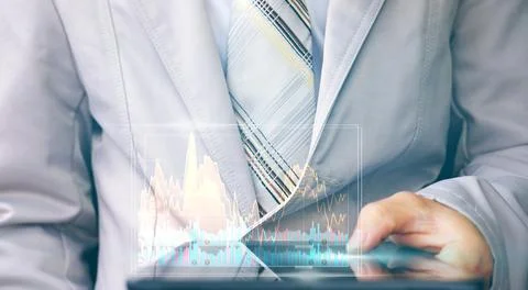 Businessman using a smartphone and technology network concepts Foto stock