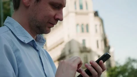 Businessman using smartphone close-up, young man writing message in phone Stock Footage 197373258