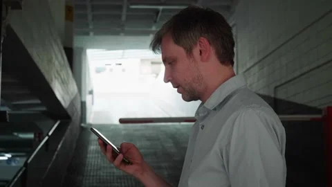 Businessman using smartphone close-up, young man writing message in phone Stock Footage 206451243