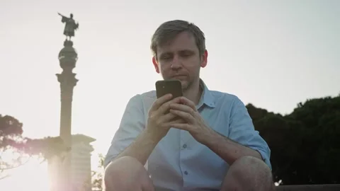Businessman using smartphone close-up, young man writing message in phone Stock Footage 245222554