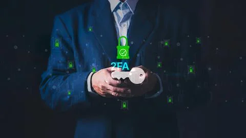 Businessman using smartphone with digital security icons Stock Photos