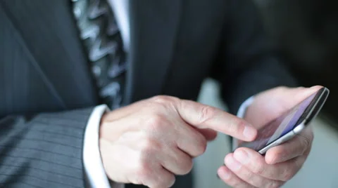 Businessman using smartphone Stock Footage 67513983
