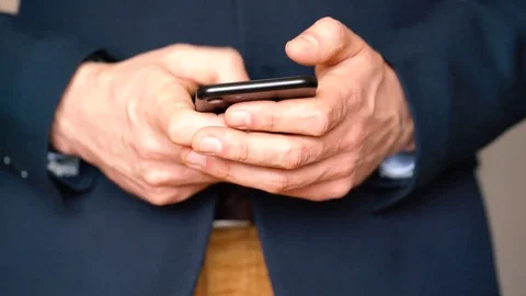 Businessman using smartphone Stock Footage 73071685