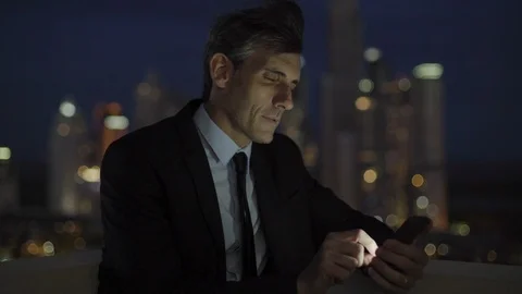 Businessman using smartphone Stock Footage 106320929