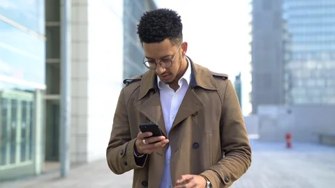 Businessman using smartphone Stock Footage 106329711