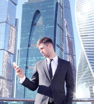 Businessman using smartphone Stock Photos