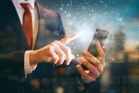 Businessman is using smartphone. Stock Photos