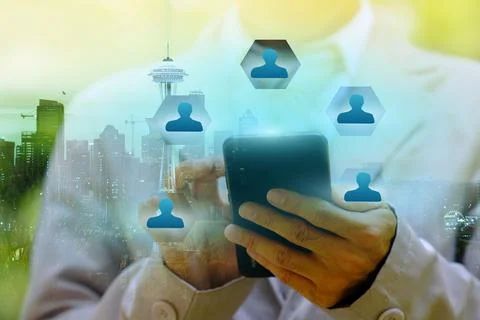 Businessman using smartphone with technology double exposure Stock Photos