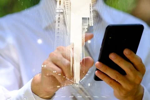 Businessman using smartphone with technology double exposure Stock Photos