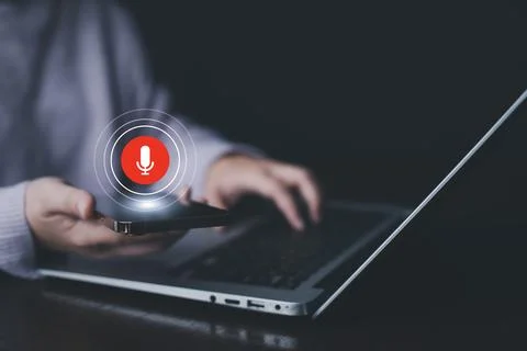Businessman using smartphone touch microphone button on virtual screen. Blog  Stock Photos