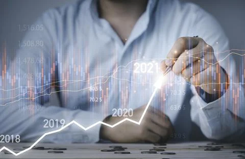 Businessman using tablet for analysis stock market technical chart Stock Photos
