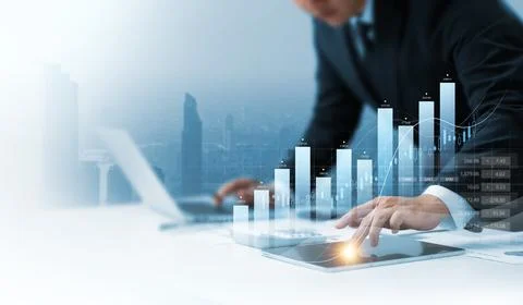 Businessman using tablet analyzing business growth graph data and progress,.. Stock Photos