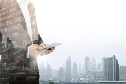 Businessman using tablet analyzing sales data and economic growth graph cha.. Stock Photos