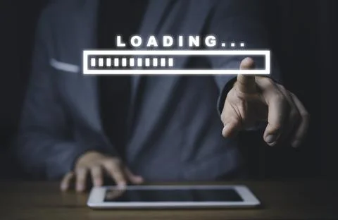 Businessman using tablet and touching to virtual loading tar for download Stock Photos