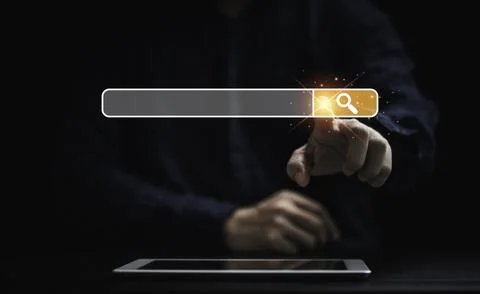 Businessman using tablet and touching to search engine bar for Searching in.. 스톡 사진