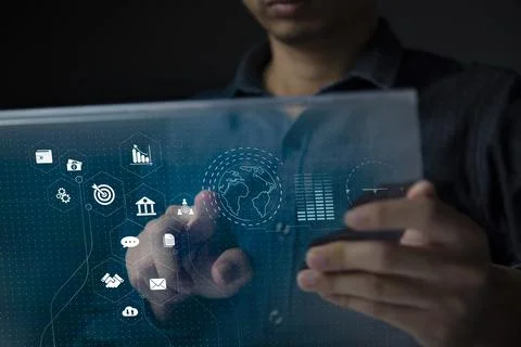 Businessman using tablet and virtual touch screen to online transactions with Stock Photos