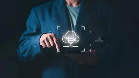 Businessman using tablet with cloud technology icon Stock Photos