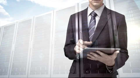 Businessman using tablet computer with data server overlay Stock Footage 51807668
