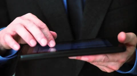 Businessman using tablet computer Video stock 60678040