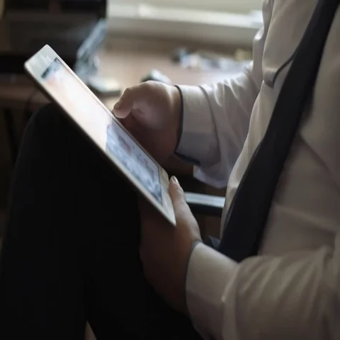 Businessman using tablet computer online shopping working from home Video stock 69586260