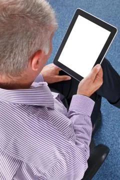 Businessman using a tablet computer Stock Photos