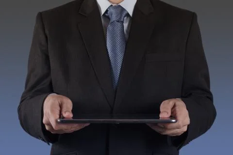 Businessman using tablet computer Stock-Fotos