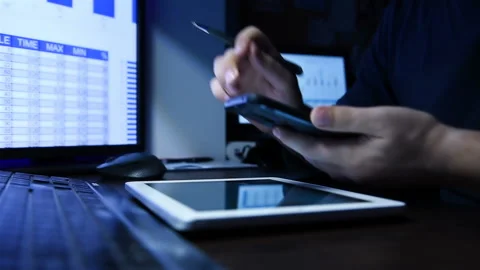 Businessman Using Tablet Computer With Spreadsheet Reports. Stock Footage 169863409